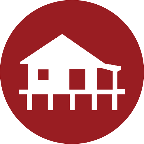 Haus auf Stelzen in einem roten Kreis