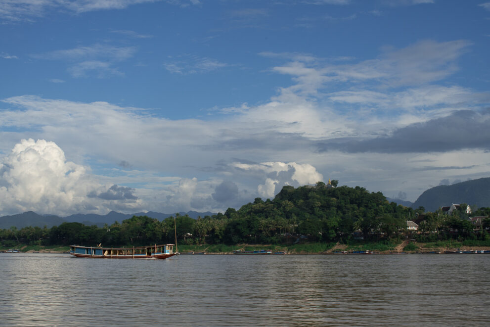 Mighty Mekong with view of Luang Prabang, Laos.